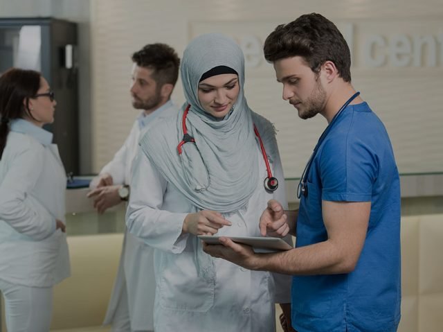saudi-arab-doctors-working-with-tablet