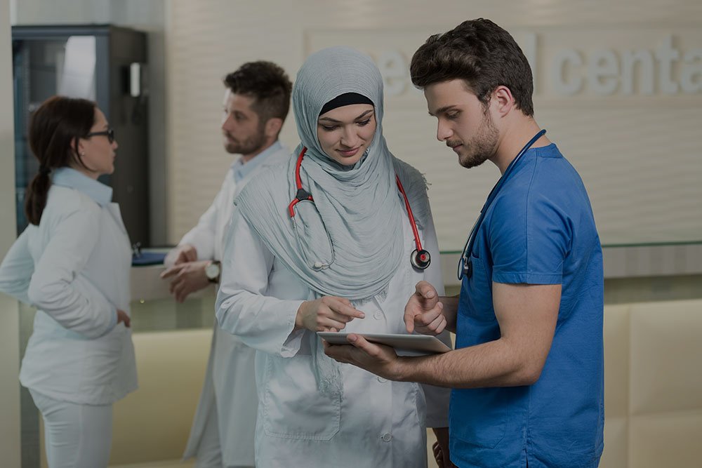 saudi-arab-doctors-working-with-tablet